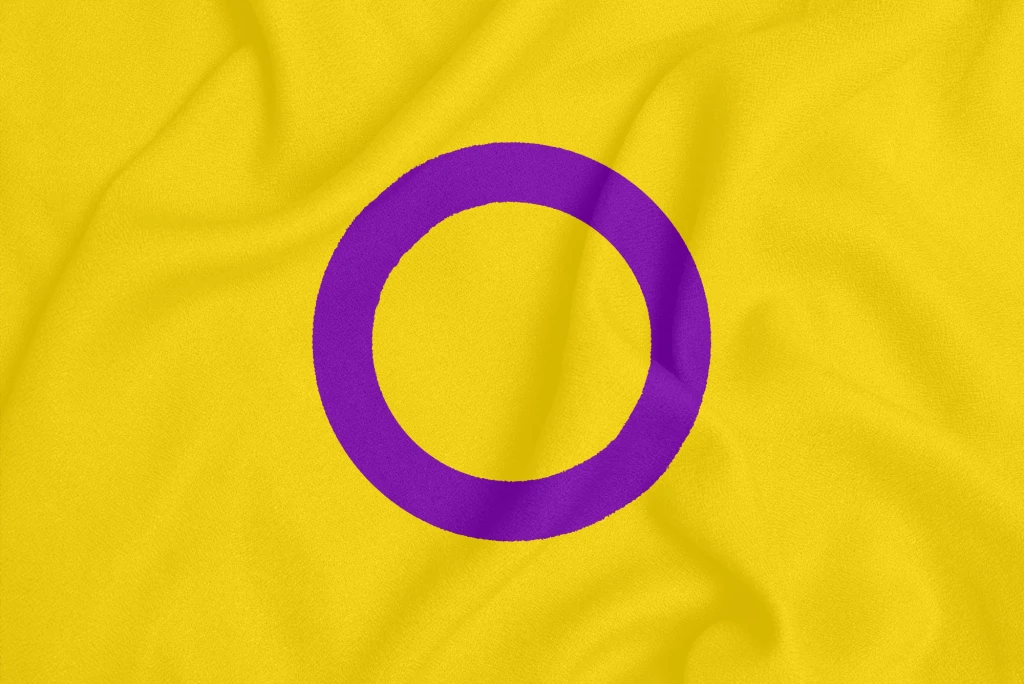 Intersex pride community flag on a textured fabric.