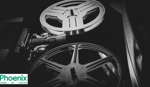 Cinema film reels in black and white.